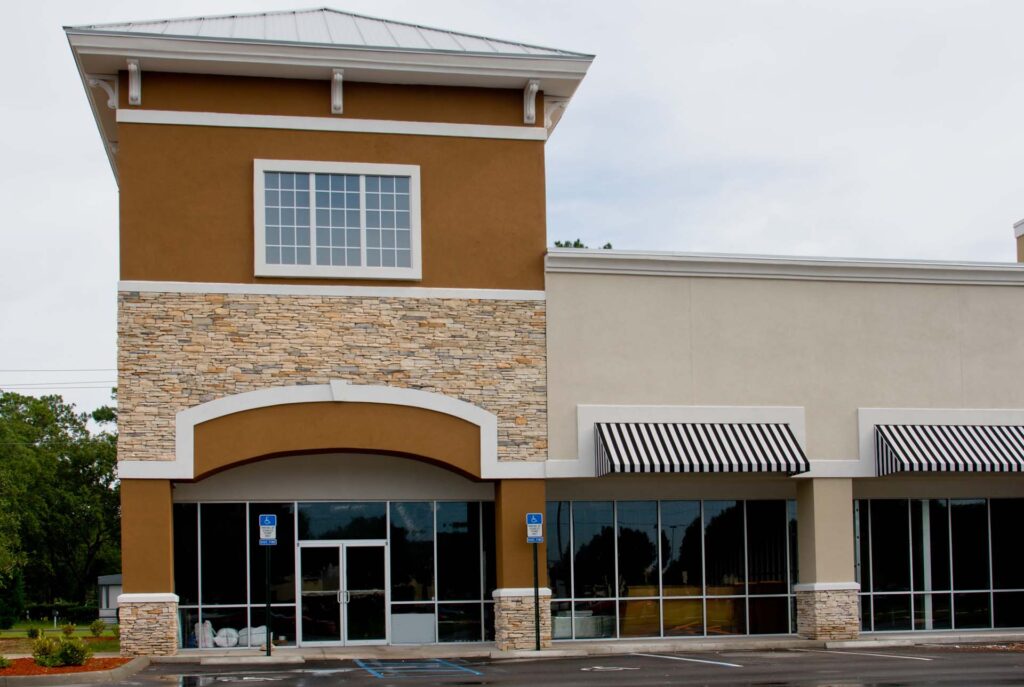 Commercial building exterior with stone accents and finished wall surfaces